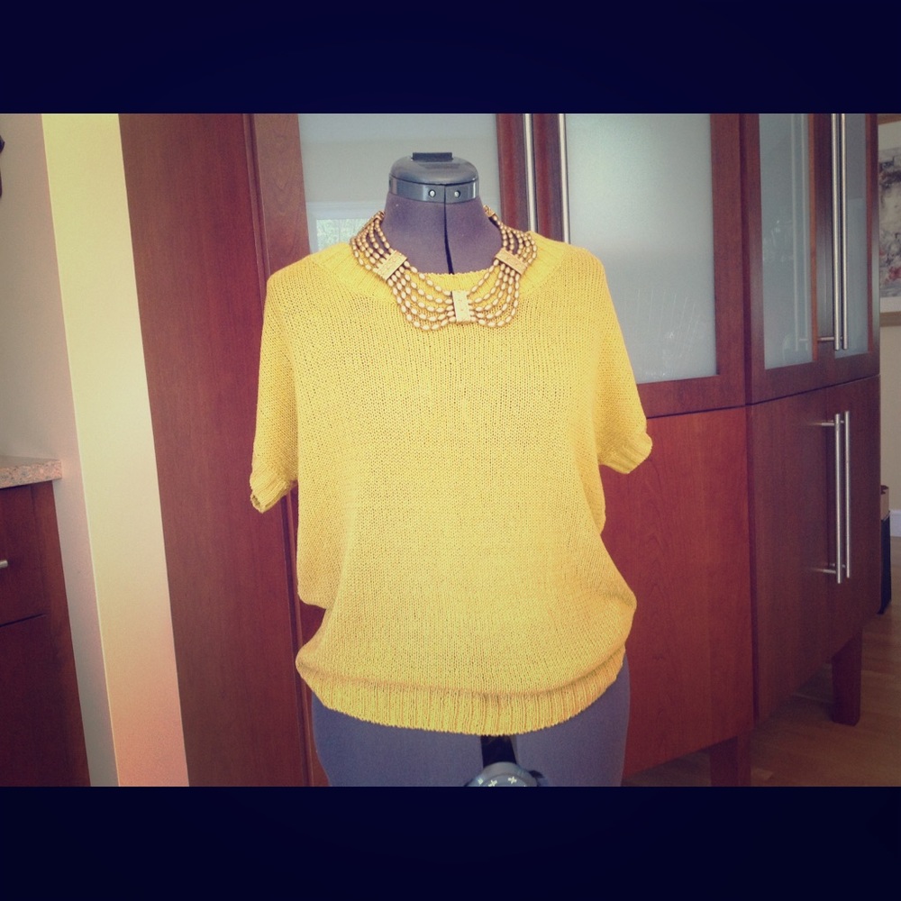 Short sleeve, loose fitting sweater